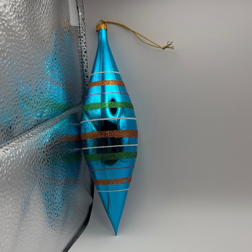 vintage 1940-1950 blue glass Christmas ornament with a torpedo shape